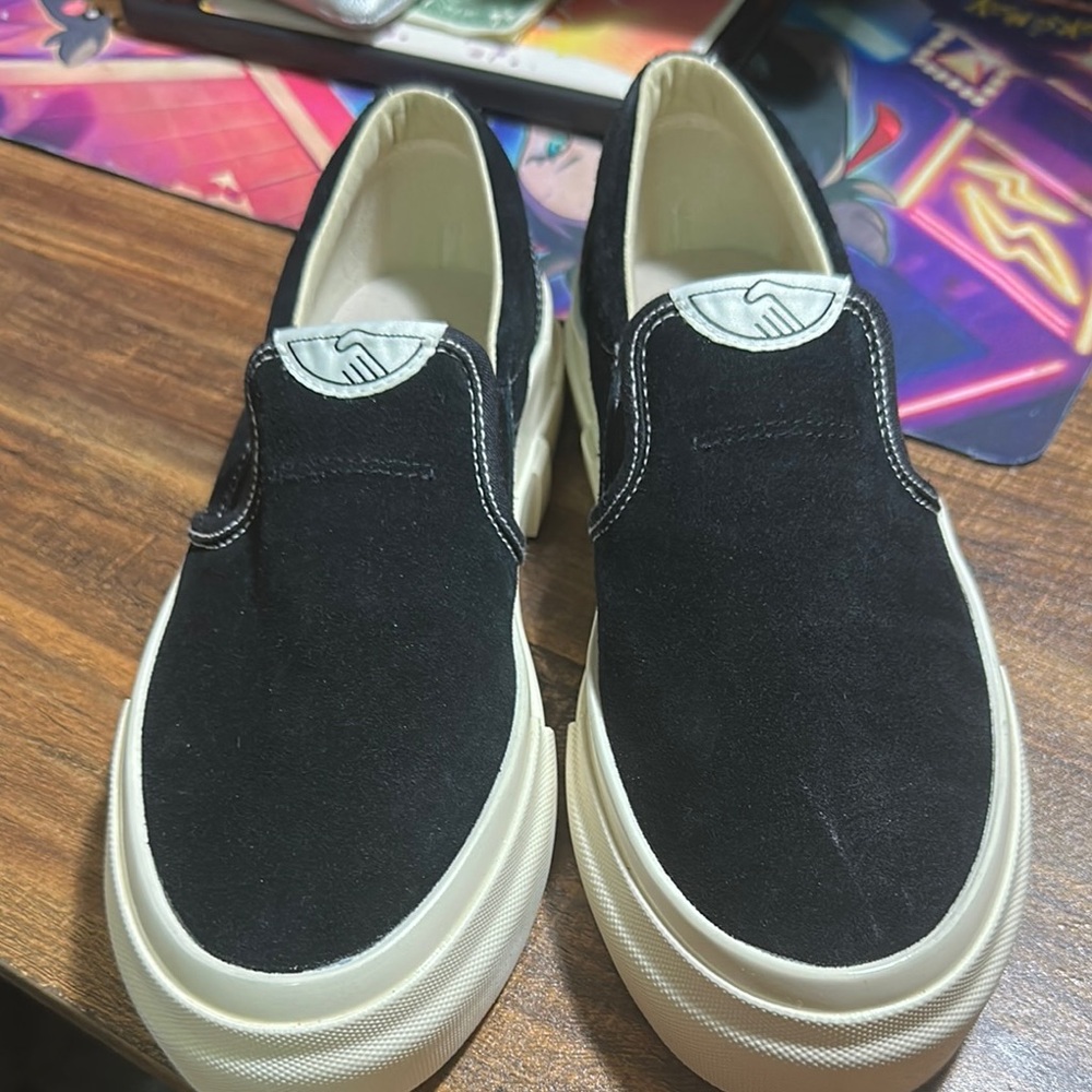 Sophisticated Black and Cream Slip-On Loafers
